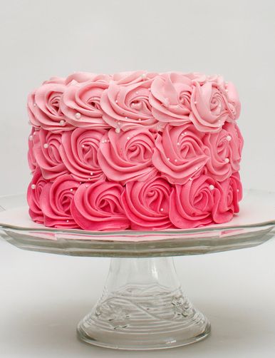 This cake is frosted in a rosette shape made with our whipped vanilla buttercream.  The colors get lighter as you get to the top and it is adorned with white pearl sprinkles. Bolo Blaze, Frosted Cake, Savory Cakes, Buckwheat Cake, Ricotta Cake, Cupcakes Decorados, Homemade Birthday, Zucchini Cake, Magic Cake