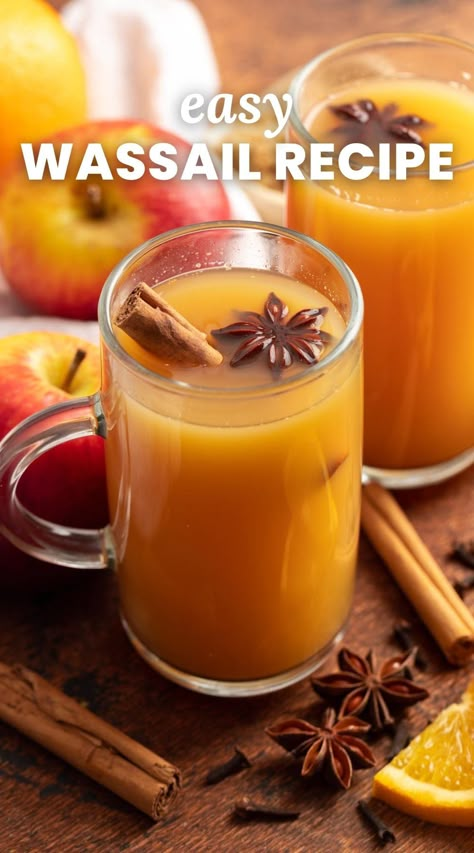 This old-fashioned holiday Wassail is easy to make with apple cider, orange juice, and cozy spices. This is a non-alcoholic recipe with options to spike it! Holiday Wassail Recipe, Wassle Drink, Wassel Recipe, Wassle Recipe, Crock Pot Wassail Recipe, Wassail Recipe Alcoholic, Spiked Wassail Recipe, Spiced Apple Juice Recipe, Wassail Recipe Traditional