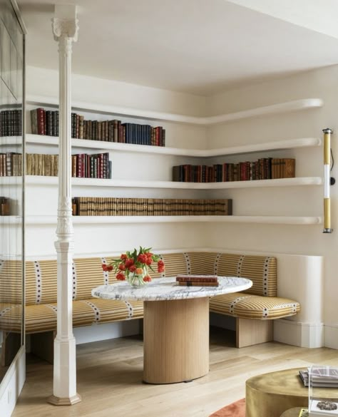 Floating Banquette, Built In Corner Banquette, Banquette With Bookshelves, Curved Corner Banquette, Banquette Detail, Striped Banquette Seating, Breakfast Nook Bench Midcentury, Bay Window Banquette, Curved Banquette Seating Restaurant