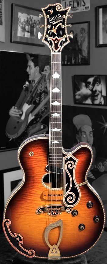 Guild 1963 Merle Travis Signature guitar. One of three made. Owned by Rick Nielsen of Cheap Trick. Estimated value? One Million dollars.... Guitar Reference, Rick Nielsen, Guild Guitars, Famous Guitars, Signature Guitar, Archtop Guitar, Unique Guitars, Cheap Trick, Guitar Collection