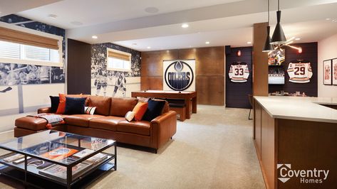 Oilers Man Cave, Oilers Basement, Edmonton Oilers Logo, Hockey Man Cave, Jewel Tone Living Room, Oilers Logo, Coventry Homes, Sports Room Decor, Paneled Walls