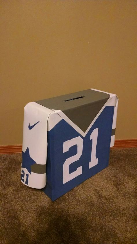 Dallas Cowboys Valentine's Day box. Ezekiel Elliott Jersey Football Shaped Valentines Boxes, Sport Valentine Boxes, Dallas Cowboys Valentine Boxes, Football Jersey Valentine Box Ideas, Nfl Valentines Boxes, Valentines Card Box Ideas For Boys, Hockey Valentine Box Ideas, Jersey Valentines Boxes, Football Jersey Valentines Boxes