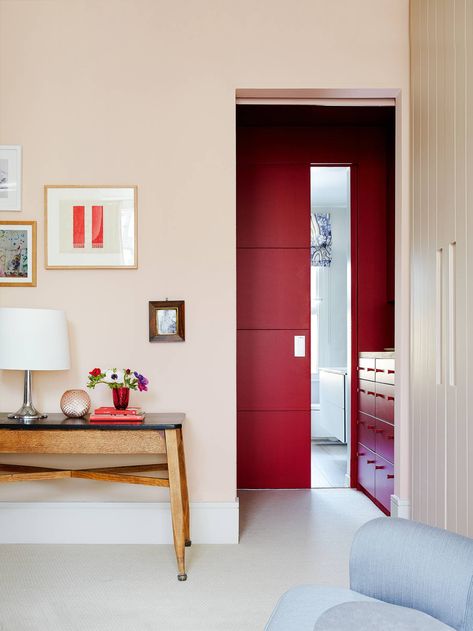 In the main bedroom, [link url="https://www.littlegreene.com/"]Little Greene[/link]’s ‘Theatre Red’ adds drama to the dressing room that leads to an en-suite bathroom. Breakfast Room Green, Timeless Paint Colors, Vintage Leather Chairs, Modernist Furniture, Vibrant Living Room, Paint Color Chart, Paint Your House, Paint And Paper Library, Bedroom Layout