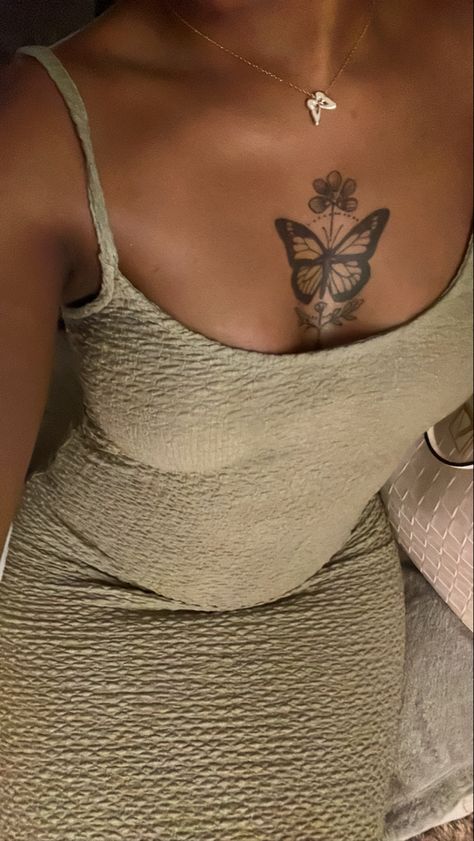 #tattooideas #butterflytattoo #tattoosforwomen #tattoo Girl Chest Tattoo Ideas For Women Black, Tattoos Black Women Dark Skin, Butterfly Tattoo Brown Skin, Tattoo For Dark Skin Women, Women Tattoos Chest, Small Tattoos On Dark Skin, Tattoo Ideas On Chest For Women, Butterfly Between Breast Tattoo, Chest Tattoo Black Women