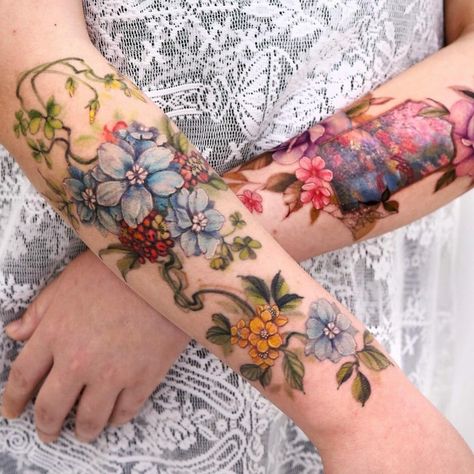 Floral Wrap Around Tattoo Color, Flower Vine Sleeve Tattoo, Small Fore Arm Tattoos For Women, Watercolor Nature Tattoo, Vintage Flowers Tattoo, Colorful Sleeve Tattoos For Women, Flowers Wrapped Around Arm Tattoo, Colorful Arm Tattoos For Women, Floral Vine Tattoos Sleeve