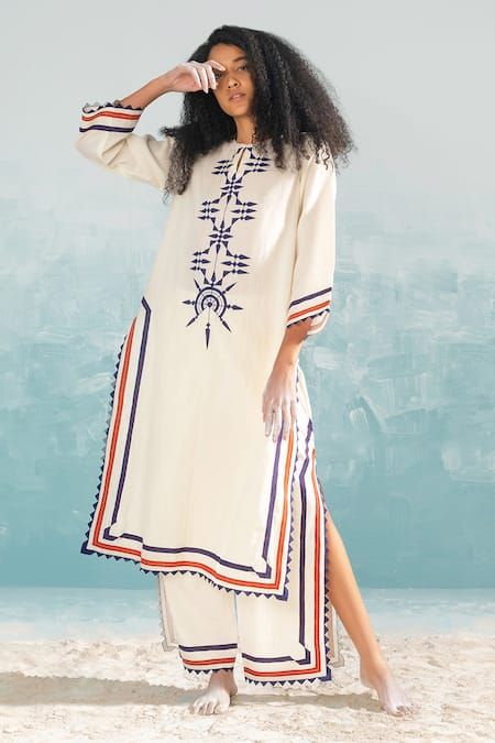 Buy Ivory Cotton Silk Chanderi Applique Round Nile Mild A-line Tunic For Women by Ikai Online at Aza Fashions. Long Kurti Patterns, Kaftan Designs, Emb Designs, Tunics Online, Tunic Designs, Denim Maxi Dress, Dress Indian Style, Pattern Embroidery, Indian Attire