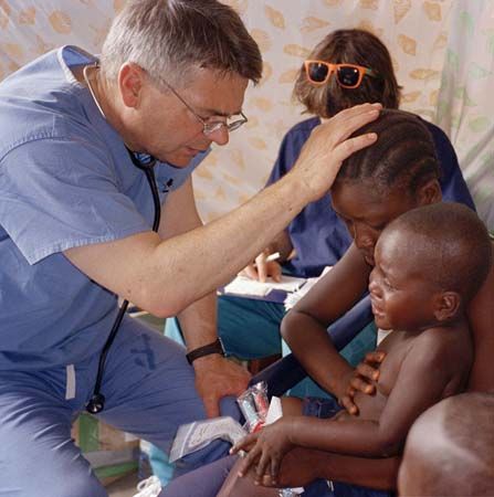 missionary praying over children. touching Acts 5, Medical Missions, Spirit Lead Me, Mission Work, Missionary Work, Missions Trip, We Are The World, Prayer Board, Inspirational Story