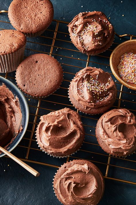 A cooling rack with some chocolate fairy cakes (small cupcakes) that are iced with chocolate buttercream icing and some still to be iced. A pot of sprinkles sits alongside. Chocolate Fairy Cakes, Fairy Cakes, Cakes Recipes, Chocolate Icing, Easy Chocolate, Plant Based, For Kids, Baking