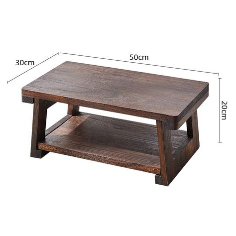 La table basse japonaise est une pièce d'ameublement inspirée du design traditionnel japonais. Elle incarne l'esthétique minimaliste, la fonctionnalité et l'harmonie des intérieurs japonais. Fabriquée avec des matériaux naturels tels que le bois ou le bambou, la table basse japonaise présente un design épuré et des lig Japanese Tea Table, Balcony Table, Table Folding, Petite Table, Small Coffee Table, Household Furniture, Japanese Tea, Pet Home, Japanese Design