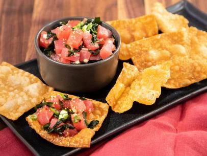 Tuna Poke with Wonton Chips Recipe | Jet Tila | Food Network Won Ton Recipes, Wonton Crisps, Jet Tila, Crisps Recipe, Tuna Ceviche, Sushi Grade Tuna, Wonton Chips, Won Ton, Tuna Poke