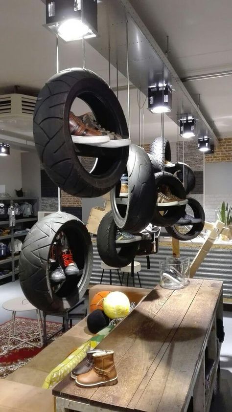 24 Useful Home And Garden Ideas Using Old Tires - 170 Motorcycle Showroom Interior, Motorcycle Showroom Design, Garden Ideas Using Old Tires, Tires Diy, Indoor Succulent Planter, Diy Garage Storage Cabinets, Shoe Store Design, Side Tables For Bedroom, Workshop Garage