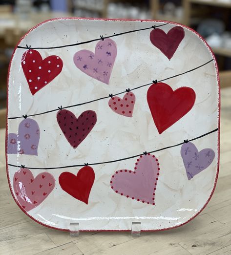 Hearts on the line Heart Pottery Painting Ideas, Valentine Pottery Painting Ideas, Pottery Painting Ideas Valentines, Valentines Pottery Ideas, Valentine Pottery Ideas, Pottery Valentine Ideas, Pottery Painting Hearts, Heart Shaped Pottery Painting Ideas, Porcelain Painting Ideas