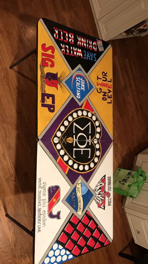 Fraternity beer pong Table Beer Dye Table Ideas Frat, Unique Pong Table Designs, Fraternity Pong Table, Fraternity Beer Pong Table, Frat Pong Table Painted, Frat Table, Beer Die Table, Frat Pong Table, Diy Table Design