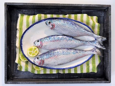 Three Fish & Lemon, one of my ceramic still life pieces from last year. My still life works take inspiration from both the old masters' still life paintings and the photography in contemporary cookbooks and foodie magazines.  #interiordesignideas #raku #ceramics #reclaimedwood #mixedmedia #kitchen #diningroom #restaurant #limitededition #wallart #MiltonKeynes #vegbox #fruitbox #marketbox #studio #openstudio #artist #creative #fishbox #stilllife #lemon Fish Still Life Photography, Lemon Fish, Fish Paintings, Snapper Fish, Ceramic Food, Lemon Painting, Food Sculpture, Still Life Paintings, Raku Ceramics