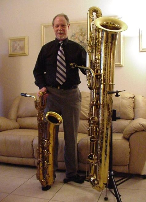 Selmer baritone sax and Eppelsheim contrabass sax  In this photo:   Randy Emerick, holy smokes bat man! Bari Sax, Bass Saxophone, Baritone Saxophone, Wind Instruments, Baritone Sax, Brass Instrument, Band Jokes, Strange Music, Saxophones