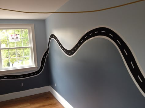 Hot Wheels Room Ideas Diy, Racetrack On Wall, Car Wall Design, Cars Themed Room Boys, Boys Racecar Bedroom Ideas, Toddler Room Car Theme, Cars Theme Bedroom Boys, Car Track On Wall, Car Themed Rooms For Boys