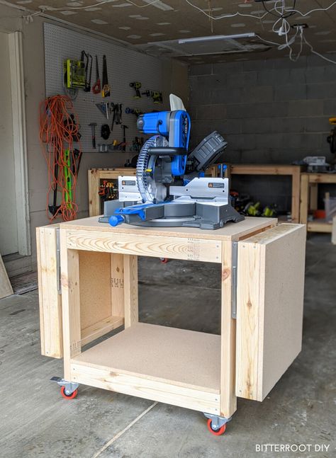 Build this DIY mobile miter saw stand with collapsible wings with free plans from Bitterroot DIY.     #woodworking #shoporganization #shoptips #woodshop #workshop #mitersawstand #workbench Diy Miter Saw Stand, Woodworking Plans Storage, Miter Saw Stand, Miter Saw Table, Table Saw Stand, Mitre Saw Stand, Saw Stand, Workbench Plans Diy, Diy Table Saw