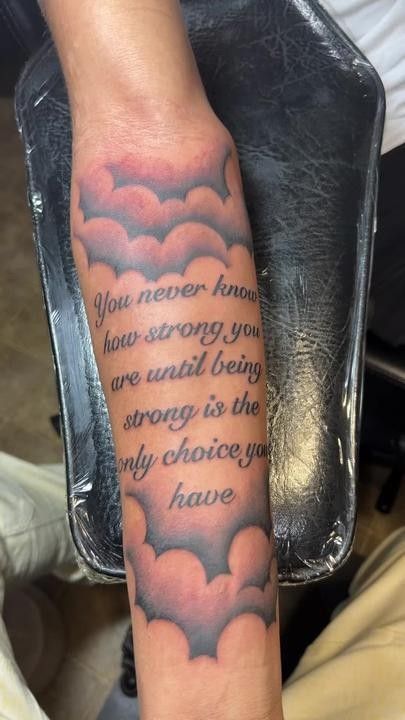 Clouds for tattoo's Cloud Tattoo Ideas For Men, Cloud And Angel Tattoo, Tattoos About Leaving The Past Behind, Cloud Tattoo With Quote, Clouds Around Words Tattoo, Tattoo Ideas For Bicep, Tattoos Clouds, Cloud Wrist Tattoo, Cloud Tattoo Shoulder