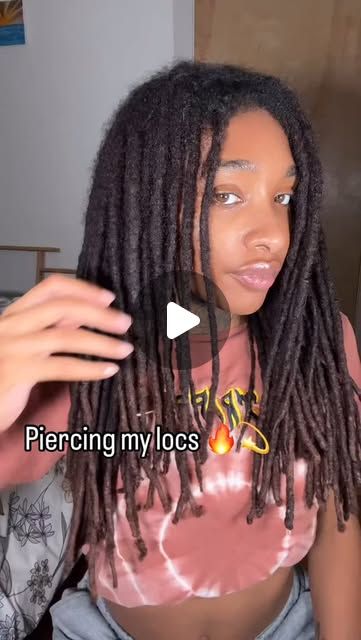 Piercing my locs is just one way I express my unique style. My locs, my way! 💖
-
-
- There’s no limit to how you can accessorize- spikes, beads, or anything in between. The possibilities are endless when it comes to making your locs stand out. Why settle for ordinary when you can turn heads? 

- comment for link or find LocXuries in bio <3
- 
- 
-
-
#dreads #dreadstagram #reels #explorepage  #dreadlocks #locstyles #naturalhair #loclife #hairinspiration #hairaccessories #hairgoals #locs" Combing My Locs Out, Artificial Dreads Styles, Beginner Locs For Women, Baddies With Locs, Real Locs On Black Women, Thick Loc Styles, Freeform Locs Women, Small Starter Locs, Types Of Dreadlocks