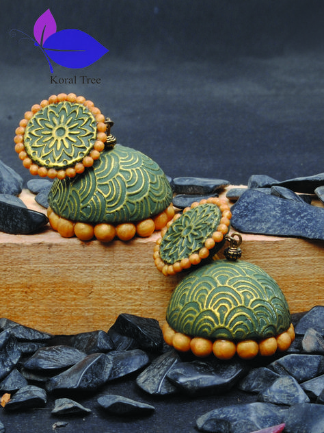 The chariming pair of traditional jhumkas have victorian textured studs. The colorful ornate domes with intricate patterns add to the  eternal elegance. - See more at: http://www.koraltree.com/Traditional/Traditional-grace-jhumka-id-1604014.html Clay Jhumka, Diy Jhumka, Terracotta Jhumkas, Traditional Jhumkas, Earrings Painting, Clay Carving, Terracotta Jewellery Making, Bamboo Jewelry, Terracotta Jewellery Designs