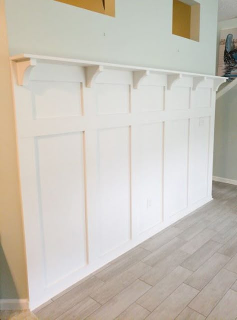 Osborne Wood Products Blog-Board and Batten Wall Topped Off with Osborne Brackets Board Abs Batten Wall, Board And Batten Wall With Shelf Ledge, Farmhouse Board And Batten Wall, Accent Wall With Shelf, Batton Walls, Diy Board And Batten Wall, Batten Board, Functional Shelf, Basement Finish