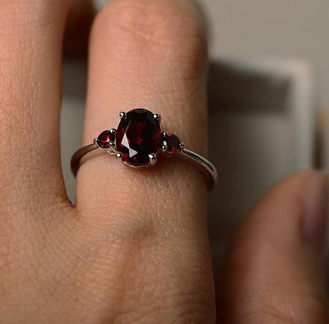 This Art Deco Oval shape garnet ring can be a good choice for engagement ring. The vintage style design makes it noble and delicate. A great gift for your loved one! Features * Made to Order. * Material: 925 Silver. * Color: Silver. * Stone Type: Natural Red Garnet.  * Stone Size: 6x8MM. * Stone Shape: Oval.  * Ready to Ship in 7-10 Business Days.  Want to find out more? Check out my shop https://www.etsy.com/shop/EARTHLYpiecesIndia Thank you for taking the time to look at my shop. I hope you en Garnet Stone Ring, January Birthstone Rings, Red Garnet Ring, Ring Birthstone, Garnet Ring, Garnet Stone, 925 Silver Ring, Ring Oval, Garnet Rings