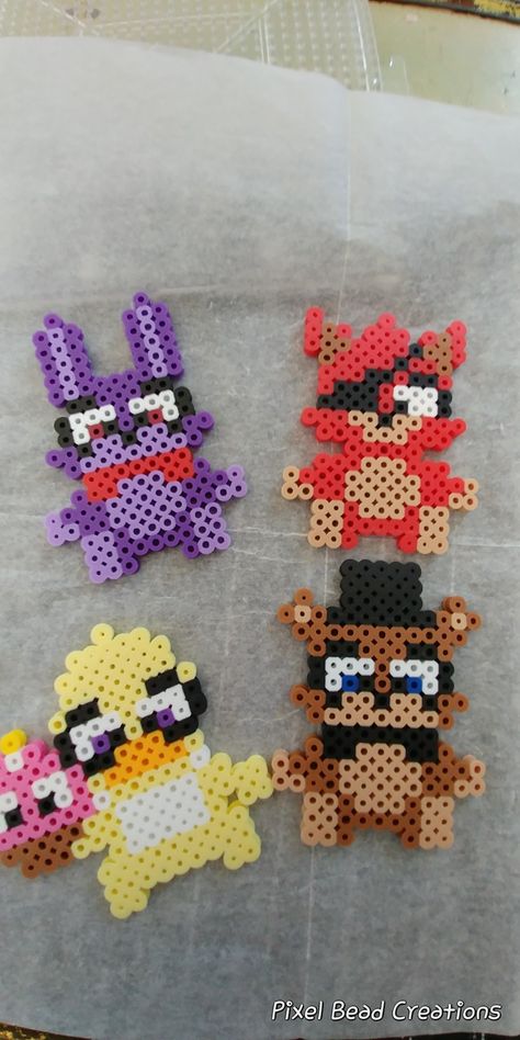 Perler Beads Cartoon Characters, Fuse Bead Art Ideas, Hana Beads Ideas, Perler Bead Patterns For Couples, Fnaf Fuse Beads, Fnaf Beads Pattern, Character Perler Bead Patterns, Perler Beads Characters, Perler Bead Patterns Fnaf