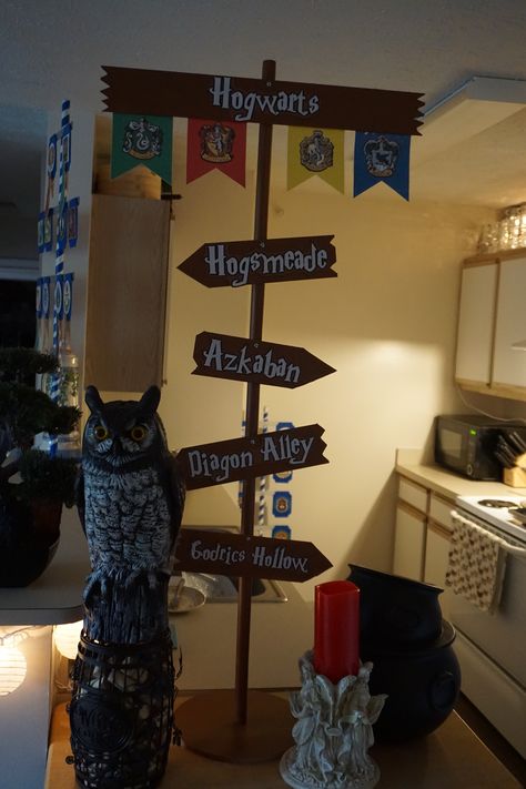 Sign post made with wood. Harry Potter themed. Harry Potter Sign Post, Hogwarts Sign, Harry Potter Dinner, Harry Potter Sign, Sign Post, Celebrity Art, Hogwarts, Harry Potter, Wood