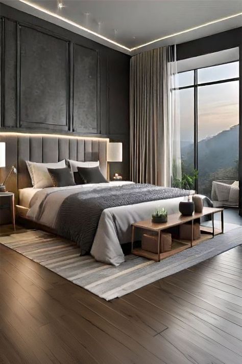 Sophisticated and Modern Bedroom Design • This elegant bedroom boasts a luxurious atmosphere with its dark-toned paneling and plush upholstered headboard. The room features a large window offering a breathtaking view that enhances the serene and expansive feel. • A minimalist color palette of grays and blacks, complemented by natural wood nightstands and a stylish coffee table at the foot of the bed, adds to the modern aesthetic. Modern Bedroom Dark, Bedroom Inspo Dark, Bedroom Male, Modern Wallpaper Bedroom, Hotel Inspired Bedroom, Bedroom Modern Luxury, Minimalist Color Palette, Hotel Style Bedroom, Bedroom Design Luxury