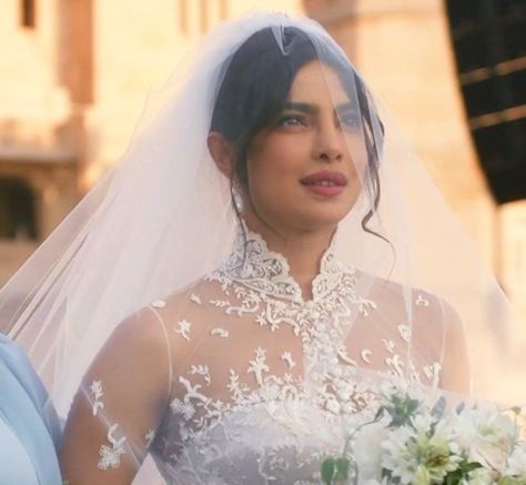 Priyanka Chopra's wedding hairstyle practically screams romance. The movie star pulled her hair back into a high updo, but she left pieces out in front for a wispy look. She topped the look off with a dramatically-long, voluminous veil. From minimalist up-dos to glamorous waves, we have hair inspo ahead for every kind of to-be-wed. See our favorite celebrity wedding hairstyles, here. Celebrity Wedding Hairstyles, Priyanka Chopra Hair, Priyanka Chopra Wedding, Celebrity Wedding Hair, Celebrity Wedding Photos, High Updo, Muslimah Wedding Dress, Wedding Makeup Tutorial, Second Wedding Dresses