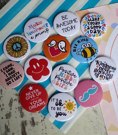 🧡 😄  Lots of bright, cute and positive badges - all for sale in our online badges shop >> https://www.koolbadges.co.uk/index.php?main_page=advanced_search_result&search_in_description=1&keyword=positive+bright&utm_content=bufferad545&utm_medium=social&utm_source=pinterest.com&utm_campaign=buffer #cute #colourful #bekind #goodvibes #spreadlove #wellbeing #badges #badgemaker #ukhandmade #beyou #shopsmall Badge Making, Badge Maker, Wedding Card Frames, Button Badges, Badge Design, Button Badge, Wooden Art, Spread Love, Button Pins