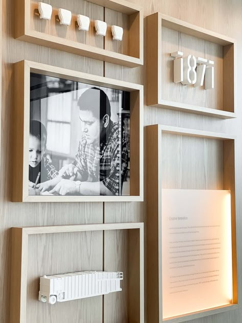 PPC — TENFOLD® | Building Brands Through Culture Wood Display Wall, Exhibition Wall Display, Museum Wall Design, Wall Branding Ideas, Office Gallery Wall Ideas, Exhibition Timeline, Company Culture Wall, Marketing Office Design, Heritage Wall