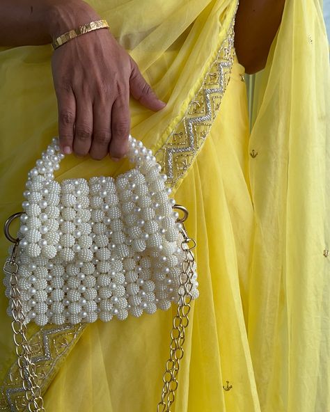 Check out our Exclusive New White Pearls Sling Bag👜 It has a metal chain along with a magnetic clasp✨ Customisation is available!✨ DM us for orders & collaboration ✨ #beads #pearl #crystals #handbag #sling #bag #mumbai #beadedbag #startup #onlineshopping #clutch #ladies #girl #women #purse #handmadebag #handmade #gifting #etsy #luxurybag #beadsaccessory #personalised #rakshabandhan #india #customised #white #color #exhibition #friendship #friendshipday Pearl Sling Bag, Raksha Bandhan, Metal Chain, Sling Bag, Handmade Bags, Pearl White, Luxury Bags, Color