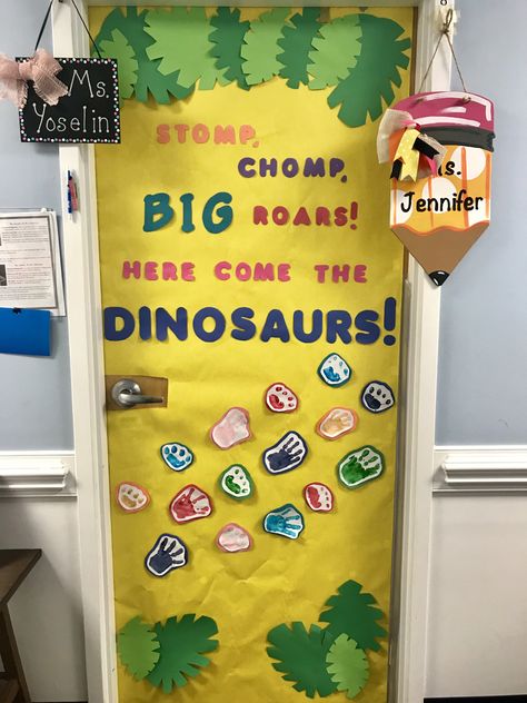 Classroom Door Ideas Dinosaurs, Dinosaur Preschool Bulletin Board, Dinosaur Preschool Decorations, Dinosaur Theme Bulletin Board, Dinosaur Daycare Theme, Classroom Dinosaur Theme, Dinosaur Hallway Decorations, Dino Door Decoration, Classroom Window Ideas Preschool