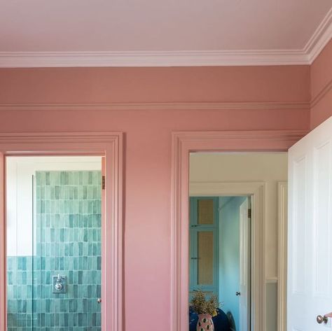 Michelle Kelly on Instagram: "Think pink -  I did exactly that for the master bedroom  with my new favourite  shade from @lick  named Nashville House .  We wanted to create a cosy cocoon like feel for this room  so we painted all the walls and woodwork in the same colour . The pink leads beautifully into the en-suite where we used a fresh cream on the walls and the green wall tiles . #michellekellystyle # bedroominspo photo by @daveycleveland" Colour Drenching, Red Headboard, Nashville House, Dark Blue Walls, Artisanal Design, Contemporary Wallpaper, Pink Paint, Spare Room, Style At Home