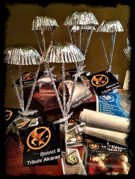 Hunger Games Silver Parachute Party Favor Hunger Games Party Decorations, Hunger Games Decorations, Hunger Games Crafts, Hunger Games Theme, Hunger Games Party, Hunger Games Movies, Games Party, Hunger Games Trilogy, Suzanne Collins