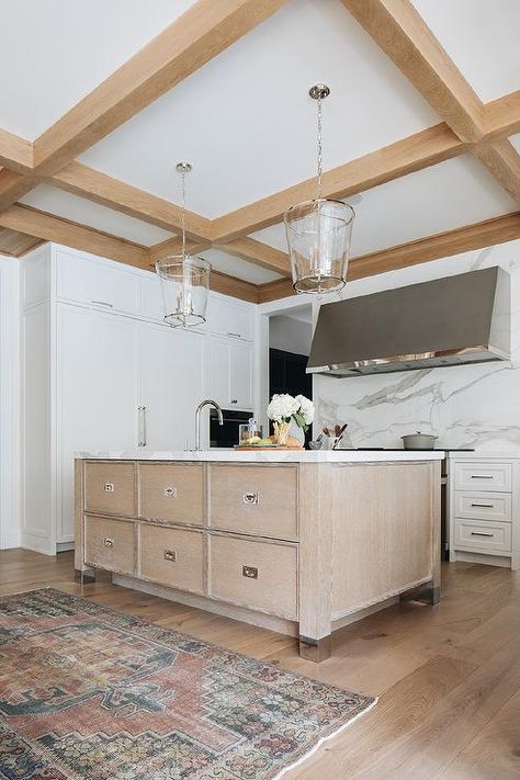 White Ceiling With Wood Beams, Mixed Wood Tones, Natural Kitchen Design, Rustic Ceiling Beams, Light Stained Wood, Slab Backsplash, Staining Wood Floors, Porcelain Slab, Vintage Style Rugs