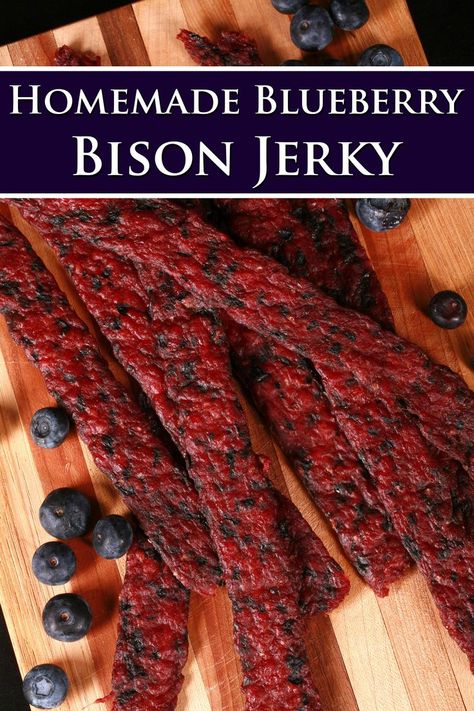 Several strips of blueberry bison jerky on a cutting board. Bear Jerky Recipe, Elk Jerky Recipe, Diy Jerky, Jerky Marinade Recipes, Ground Beef Jerky Recipe, Rv Camping Recipes, Jerky Marinade, Blueberry Sauce Recipe, Dehydrated Recipes