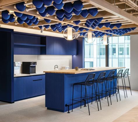 How Clay Makes a Big Impact in This Vancouver Office Check In Desk Design, Blue Tiles Kitchen, Office Coffee Area, Coworking Design, Blue Kitchen Tiles, Work Cafe, Blue Cafe, Office Pantry, Analog Devices