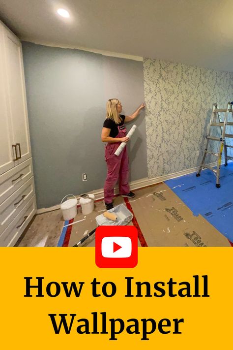 The words "How to Install Wallpaper" sit below a photo of a woman pointing to blue feature wall wallpaper in a bedroom surrounded by a ladder, wallpaper paste and tools. Installing Wallpaper, Wallpaper Repair, How To Wallpaper, Hang Wallpaper, Install Wallpaper, Wallpaper Video, How To Hang Wallpaper, Matching Patterns, How To Install Wallpaper