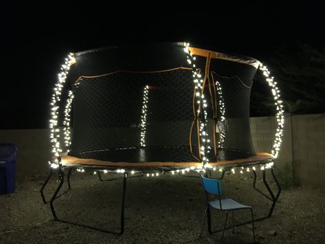 Lit up our trampoline with LED Christmas lights. Rectangle Trampoline, Water Trampoline, Backyard Trampoline, Led Christmas Lights, 14th Birthday, Garden Pool, Pink Parties, Fairy Lights, String Lights