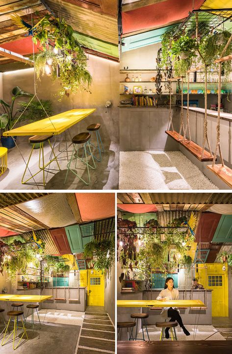 Q&A Architecture Design Research have designed Barraco, a new bar in Shanghai, China, that features recycled materials, swings and a hanging table. #BarDesign #InteriorDesign Tropical Hostel Design, Tropical Cafe Design, Tropical Hostel, Recycled Interior Design, Recycle Design, Hostels Design, Warehouse Design, Hanging Table, Cafe Interior Design