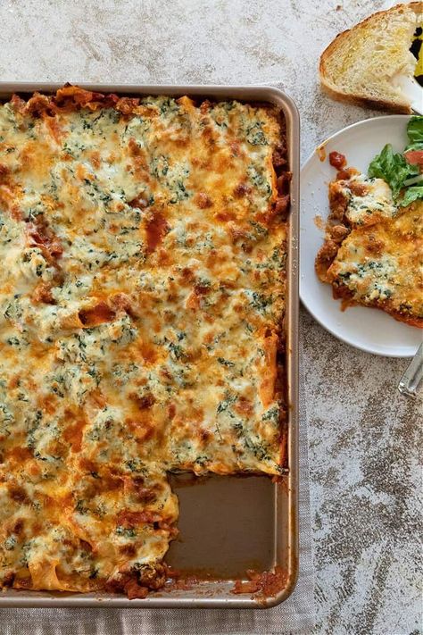 Sheet Pan Lasagna has all the flavors of traditional lasagna without the labor of layering several ingredients before baking. #recipes #dinner #italian #pasta #easyrecipes #cheese Sheet Pan Lasagna Giada, Baking Recipes Dinner, Sheet Pan Lasagna, Pan Lasagna, Italian Sausage Lasagna, Pesto Sauce For Pasta, Dinner Italian, Sausage Lasagna, Lasagna Ingredients