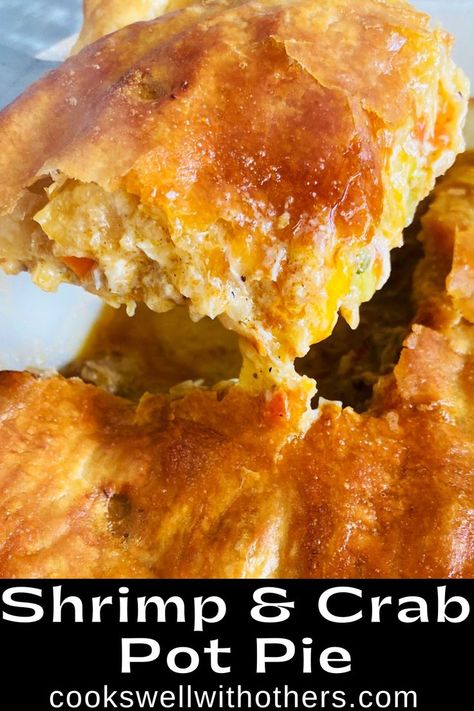 Seafood pot pie coming out of the casserole dish Louisiana Crab Pie, Shrimp Pie New Orleans, Shrimp Pie Recipes, Southern Crab Pie, Seafood Pot Pie Puff Pastry, Seafood Puff Pastry Recipes, Cajun Seafood Pot Pie, Crab Pies, Shrimp And Crab Recipes