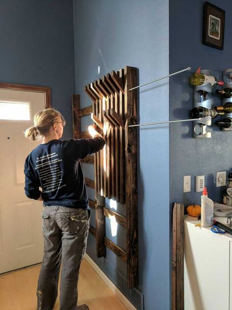 We replaced our insufficient (and ugly) aluminum coat rack with a "piano" coat rack. Total cost about $250 not including the wine drunk during the staining phase. - Imgur Piano Coat Rack, Diy Coat Rack, Modern Coat Rack, Wood Projects That Sell, Home Entrance Decor, Entry Hall, Entrance Decor, Diy Wood Projects, Storage And Organization