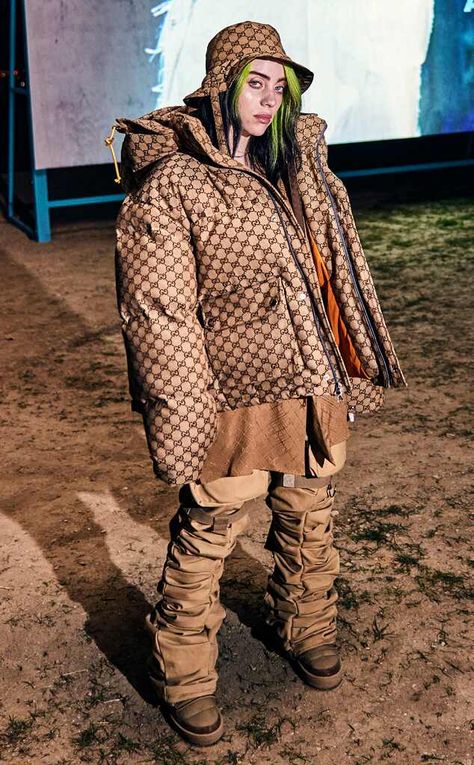 Singer Billie Eilish rocks a coveted Gucci x The North Face puffer jacket and matching Gucci bucket hat to the Los Angeles premiere event for her new documentary, Billie Eilish: The World's A Little Blurry. Suits Actress, Gucci Bucket Hat, Balenciaga Sandals, The North Face Puffer Jacket, Green Raincoat, The North Face Puffer, North Face Puffer Jacket, Gold And Black Dress, Berlin Fashion Week