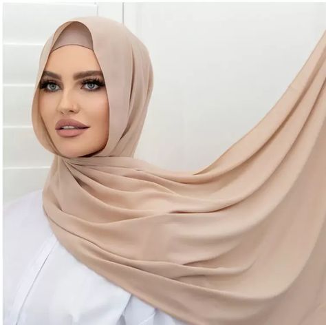 "Effortless Elegance ✨ Embrace timeless style with our Chiffon Long Hijab/Scarf in stunning beige. Its lightweight and breathable fabric ensures comfort throughout the day. Pair it with your favorite outfit for a chic and modest look. 😍 #ChiffonLongHijab #BeigeScarf #ModestFashion #HijabStyle #TimelessElegance" Beige Hijab, Long Hijab, Modest Outfits Muslim, Outfits Muslim, Beige Scarf, Beige Wedding, Style Hijab, Wedding Hijab, Hijab Scarf