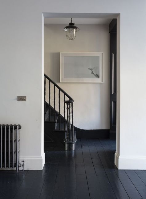 15 Painted Floors That Will Make You Want To Grab A Paintbrush Sally House, Hallway Makeover Before And After, Black Floorboards, Black Floors, Painted Floorboards, Hallway Makeover, Painted Wood Floors, Dark Floors, Hal Decor