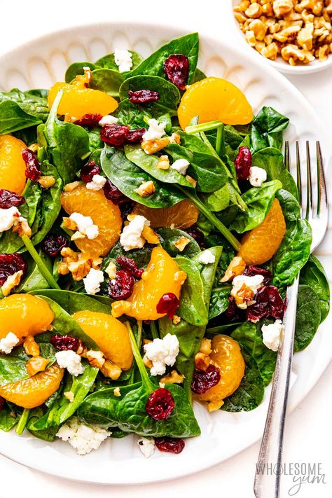 You'll love this easy mandarin orange salad with spinach, goat cheese, walnuts, cranberries, and a sweet orange honey vinaigrette. Spinach And Orange Salad, Spinach Salad Recipes Mandarin Oranges, Spinach Salad Mandarin Oranges, Mandarin Spinach Salad, Orange Avocado Salad, Spinach Salad With Oranges, Strawberry Orange Salad, Green Salad With Mandarin Oranges, Beet And Mandarin Orange Salad