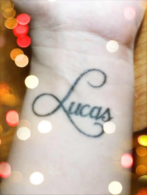 Lucas Tattoo Name, Wrist Tats, Tattoo For Son, Memorial Tattoo, Name Tattoo Designs, Color Me Beautiful, Wrist Tattoo, Baby Tattoos, Name Tattoo